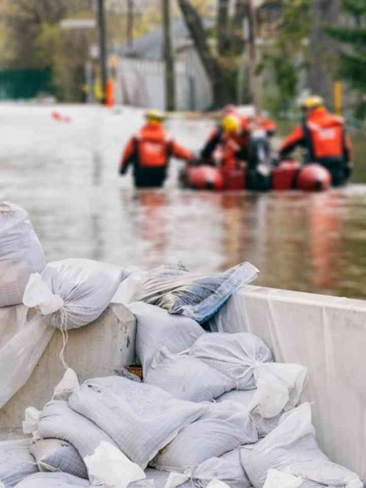 Men in flooded river